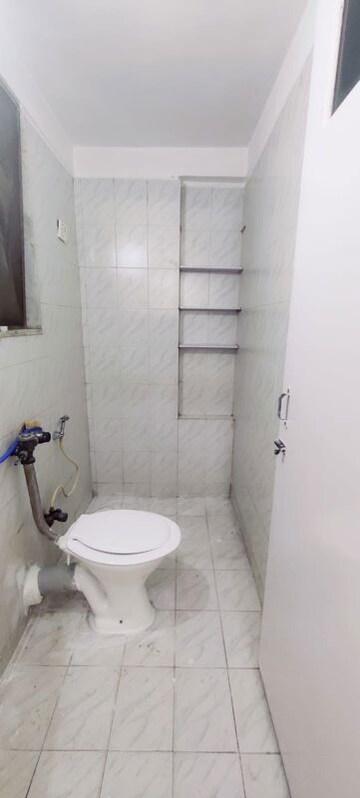 Bathroom in 1 BHK Apartment at Royal Pleasant Park CHS, Malad West – for Rent