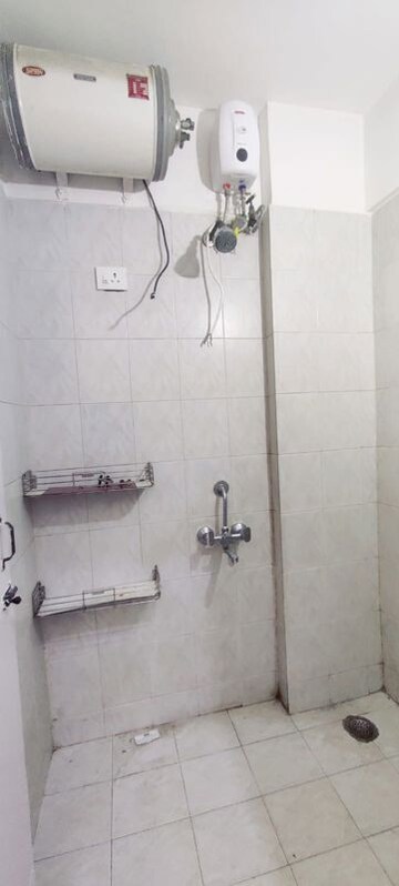 Bathroom in 1 BHK Apartment at Royal Pleasant Park CHS, Malad West – for Rent