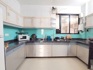 Kitchen in 3 BHK Apartment at Oxford Village Condominium, Wanowrie – for Rent