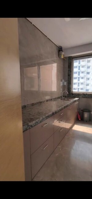 Kitchen in 3 BHK Apartment at Laxmi Raajvilas Malad, Malad West – for Rent