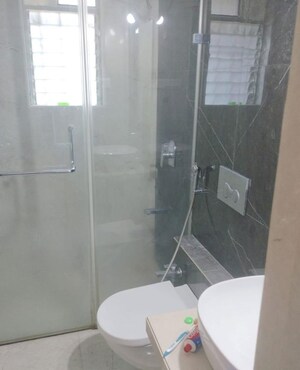 Bathroom in 2 BHK Apartment at Lodha Amara, Kolshet Road – for Rent