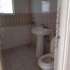 Bathroom in 2.5 BHK Apartment at Charms Castle Phase II, Sehani Khurd – for Rent
