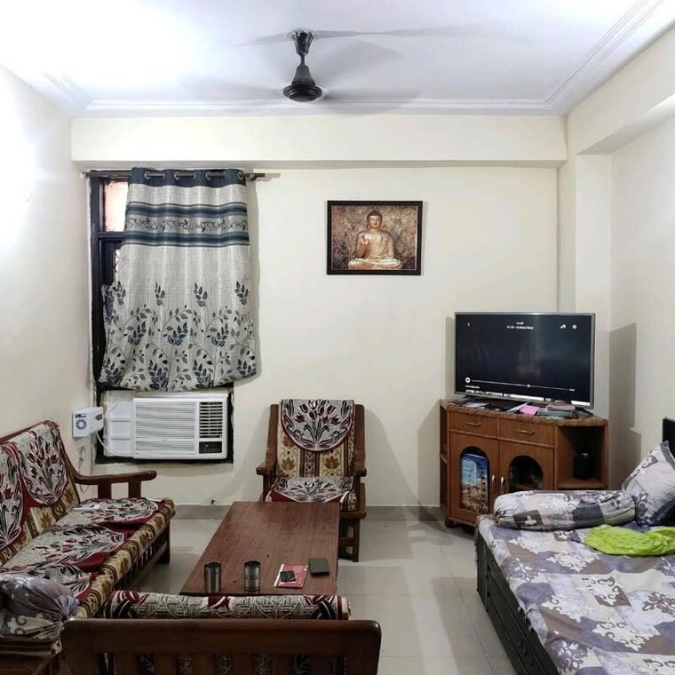 Living Room, charms-castle-phase-ii 2.5 Bedroom 1180 Sq.Ft. Apartment In Sehani Khurd Ghaziabad 9862162