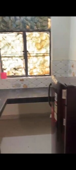 Kitchen in 1 RK Apartment at RPS Savana, Sector 88 – for Rent