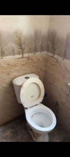 Bathroom in 1 RK Apartment at RPS Savana, Sector 88 – for Rent