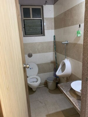 Bathroom in  Office Space at Sheladia One World West, Ambli – for Rent