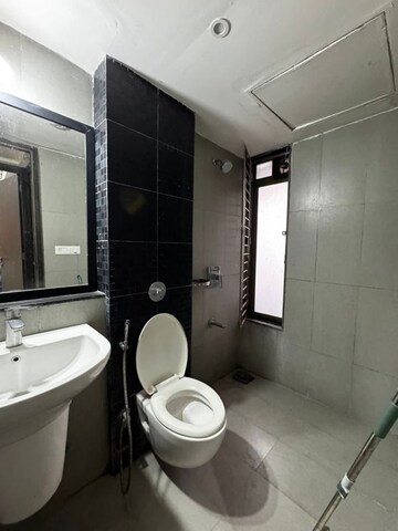 Bathroom in 1.5 BHK Apartment at Lodha Splendora, Ghodbunder Road – for Rent