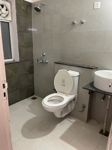 Bathroom in 2 BHK Apartment at Sushma Joynest ZRK, Ghazipur – for Rent
