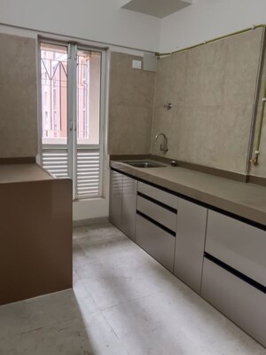 Kitchen in 2 BHK Apartment at Dosti West County, Balkum Pada – for Rent