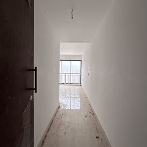 Building Lobby in 2 BHK Apartment at Dynamix Divum, Riddhi Gardens – for Rent