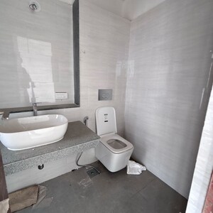 Bathroom in 2 BHK Apartment at Dynamix Divum, Riddhi Gardens – for Rent