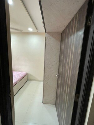 Bedroom in 2 BHK Apartment at Chandiwala Pearl Harmony, Andheri West – for Rent