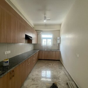 Kitchen in 3 BHK Apartment at Adani Oyster Greens, Sector 102a – for Rent