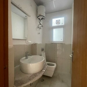 Bathroom in 3 BHK Apartment at Adani Oyster Greens, Sector 102a – for Rent