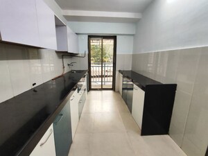 Kitchen in 3 BHK Apartment at Conwood Enclave, Vasant Vihar – for Rent