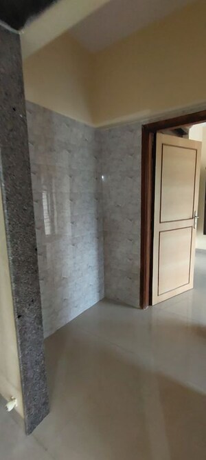 Building Lobby in 2 BHK Apartment at K Raheja Heights, Malad East – for Rent