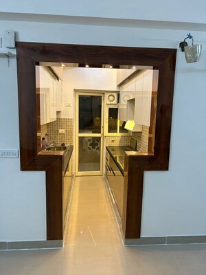 Kitchen in 2 BHK Apartment at Mahagun Moderne, Sector 78 – for Rent