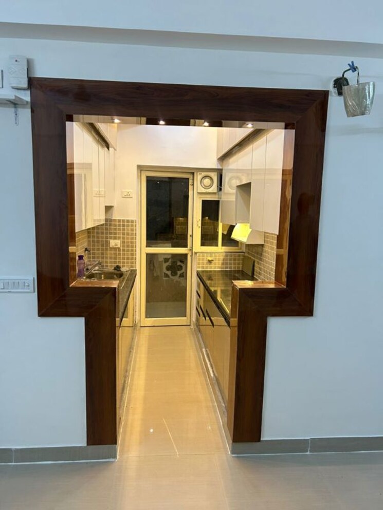 Kitchen, mahagun-moderne 2 Bedroom 1250 Sq.Ft. Apartment In Sector 78 Noida 9863210