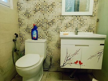 Bathroom in 3 BHK Apartment at Mahagun Moderne, Sector 78 – for Rent