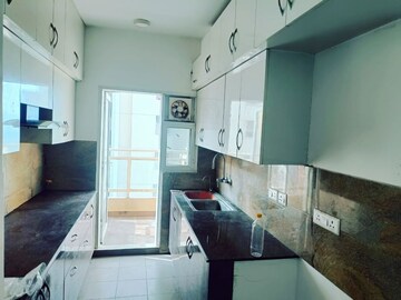 Kitchen in 3 BHK Apartment at Mahagun Moderne, Sector 78 – for Rent