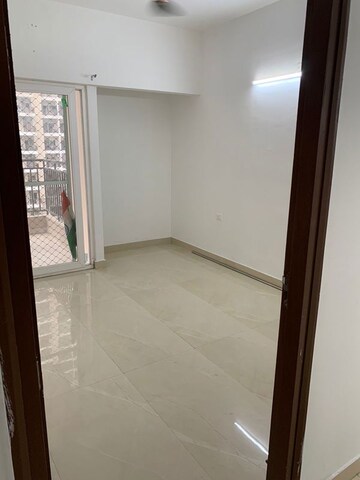 Room in 3 BHK Apartment at Mahagun Moderne, Sector 78 – for Rent