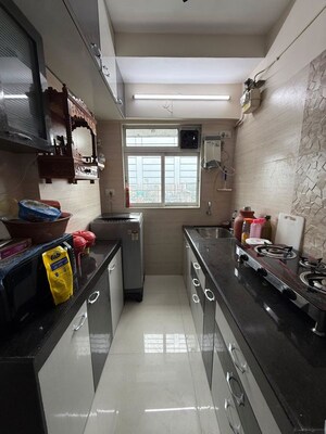 Kitchen in 1.5 BHK Apartment at Sanskruti Splendour, Dahisar East – for Sale