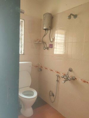 Bathroom in 2 BHK Apartment at Vedant Complex CHS, Samata Nagar – for Rent