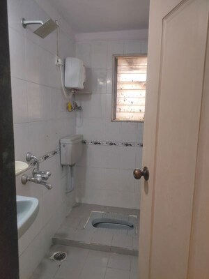 Bathroom in 2 BHK Apartment at Vedant Complex CHS, Samata Nagar – for Rent