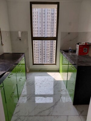 Kitchen in 1 BHK Apartment at Raymond Ten X Habitat, Pokhran Road No Two – for Rent