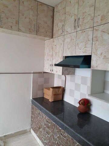 Kitchen in 3 BHK Apartment at Mahagun Moderne, Sector 78 – for Rent