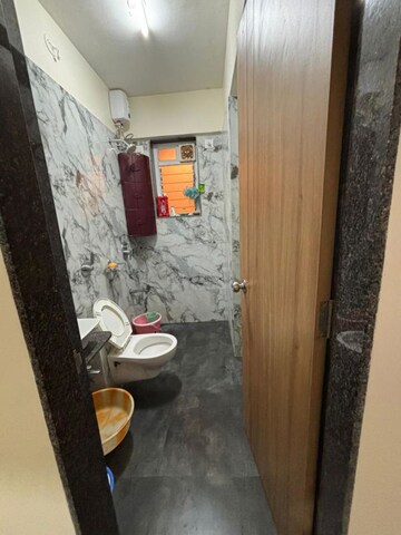 Bathroom in 2 BHK Apartment at Samarpan Hiranmay Niwas CHS, Borivali East – for Rent