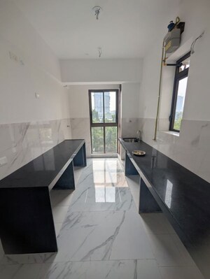 Kitchen in 2 BHK Apartment at Raymond Ten X Habitat, Pokhran Road No Two – for Rent