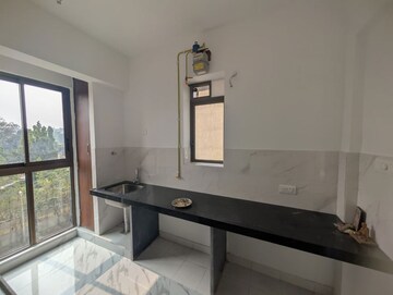 Kitchen in 2 BHK Apartment at Raymond Ten X Habitat, Pokhran Road No Two – for Rent