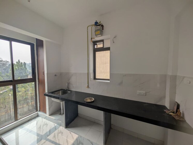 Kitchen, raymond-ten-x-habitat 2 Bedroom 565 Sq.Ft. Apartment In Pokhran Road No Two Thane 9863511