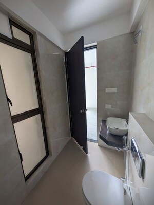 Bathroom in 2 BHK Apartment at Raymond Ten X Habitat, Pokhran Road No Two – for Rent