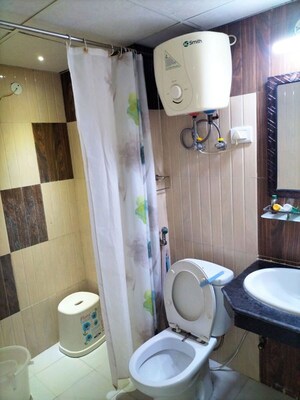 Bathroom in 4 BHK Apartment at Mahagun Moderne, Sector 78 – for Rent