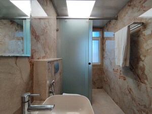 Bathroom in  Apartment at Bhartiya Nikoo Homes Phase 2, Thanisandra Main Road – for Rent