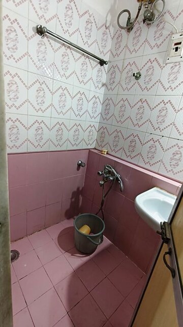 Bathroom in 1 BHK Apartment at Jyoti Complex, Goregaon East – for Rent