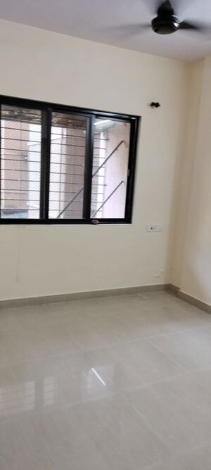 Room in 1 BHK Apartment at Kanchan Pushp Society, Ghodbunder Road – for Rent