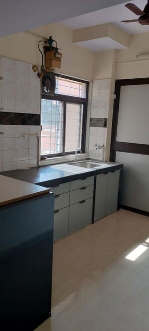 Kitchen in 1 BHK Apartment at Kanchan Pushp Society, Ghodbunder Road – for Rent