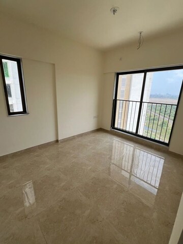 Room in 3 BHK Apartment at Sunteck Maxxworld, Tivri – for Sale