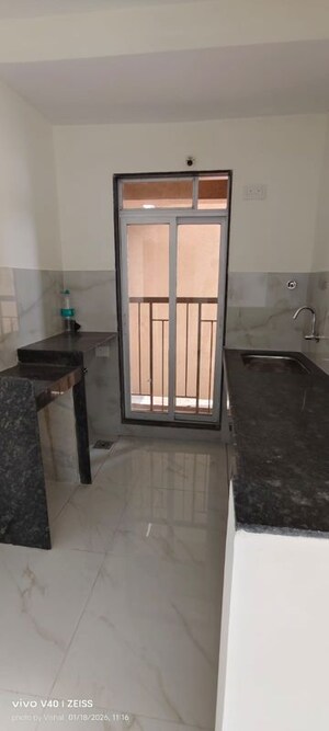 Kitchen in 1 BHK Apartment at Metropolis Bayside, Kasarvadavali – for Rent