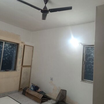 Living Room in 2 BHK Apartment at Erandavane CHS, Erandwane – for Rent