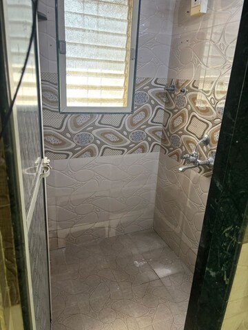 Bathroom in 1 BHK Apartment at Pavan Putra CHS, Dahisar East – for Rent