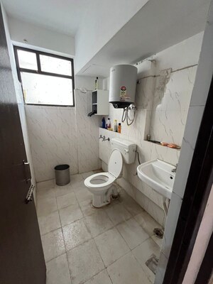 Bathroom in 3 BHK Apartment at Auric City Homes, Sector 82 – for Rent