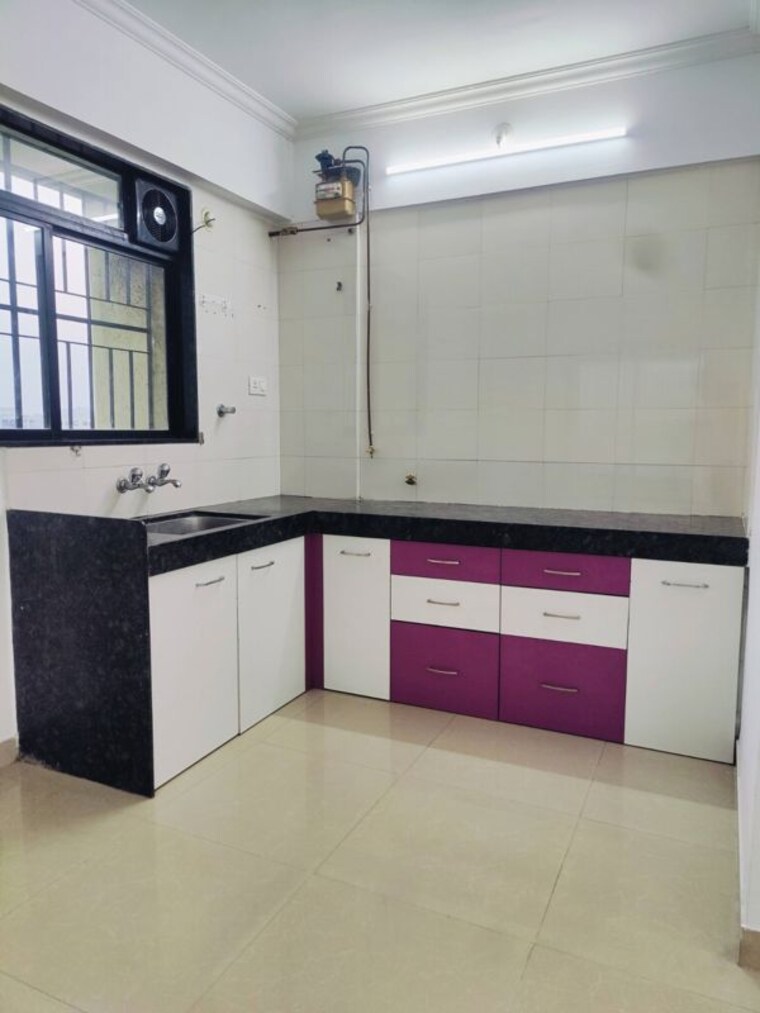 Kitchen, mont-vert-seville-phase-i 2 Bedroom 840 Sq.Ft. Apartment In Wakad Pune 9863784