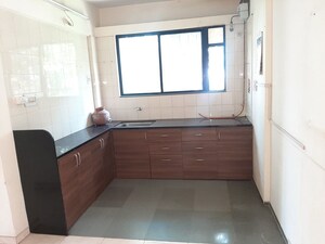 Kitchen in 2.5 BHK Apartment at Anandvan Residency, Anand Nagar – for Rent