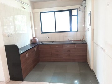 Kitchen in 2.5 BHK Apartment at Anandvan Residency, Anand Nagar – for Rent