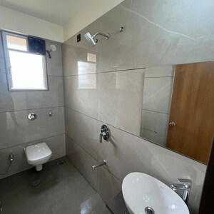 Bathroom in 3 BHK Apartment at Pimple Saudagar – for Rent