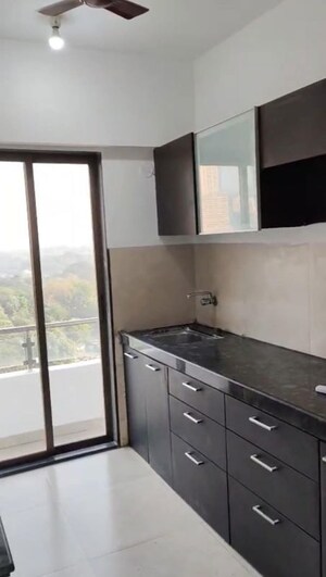 Kitchen in 4 BHK Apartment at Oberoi Realty Park View, Kandivali East – for Sale